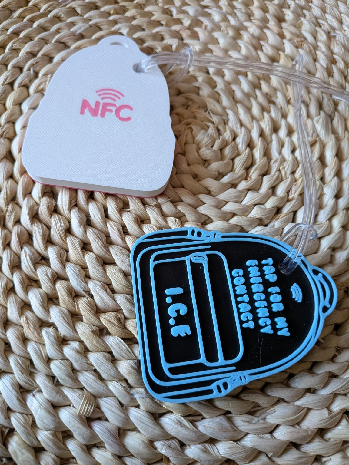 NFC backpack bag tags showing black-blue front and white-pink reverse