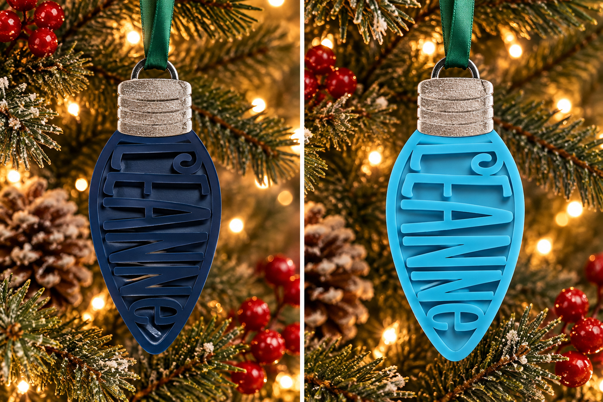 Personalized Christmas light bulb name ornament in navy and cerulean blue